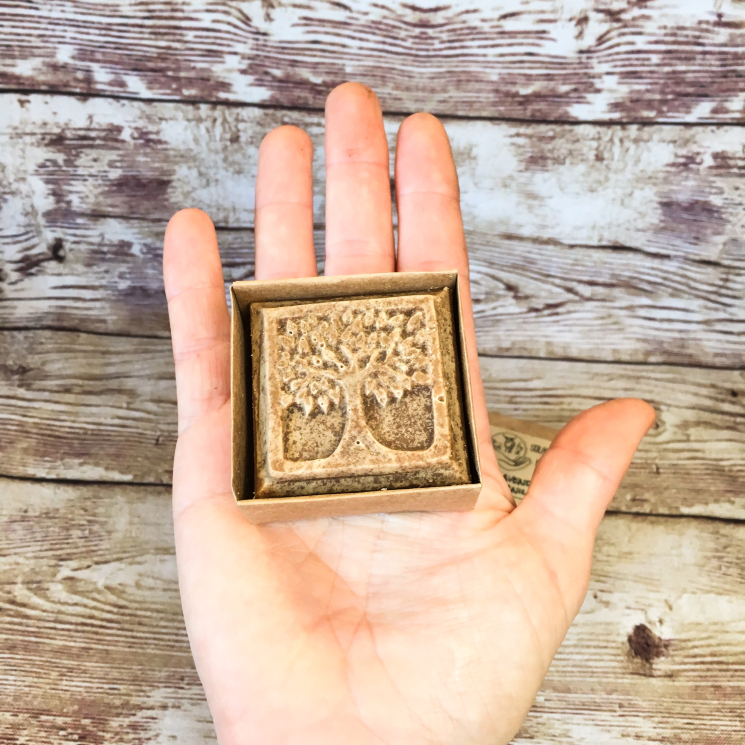 2 oz Tree of Life Soap in Palm of Hand