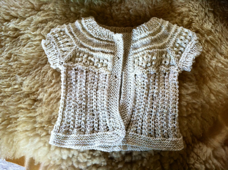 Baby sweater, feedsack string